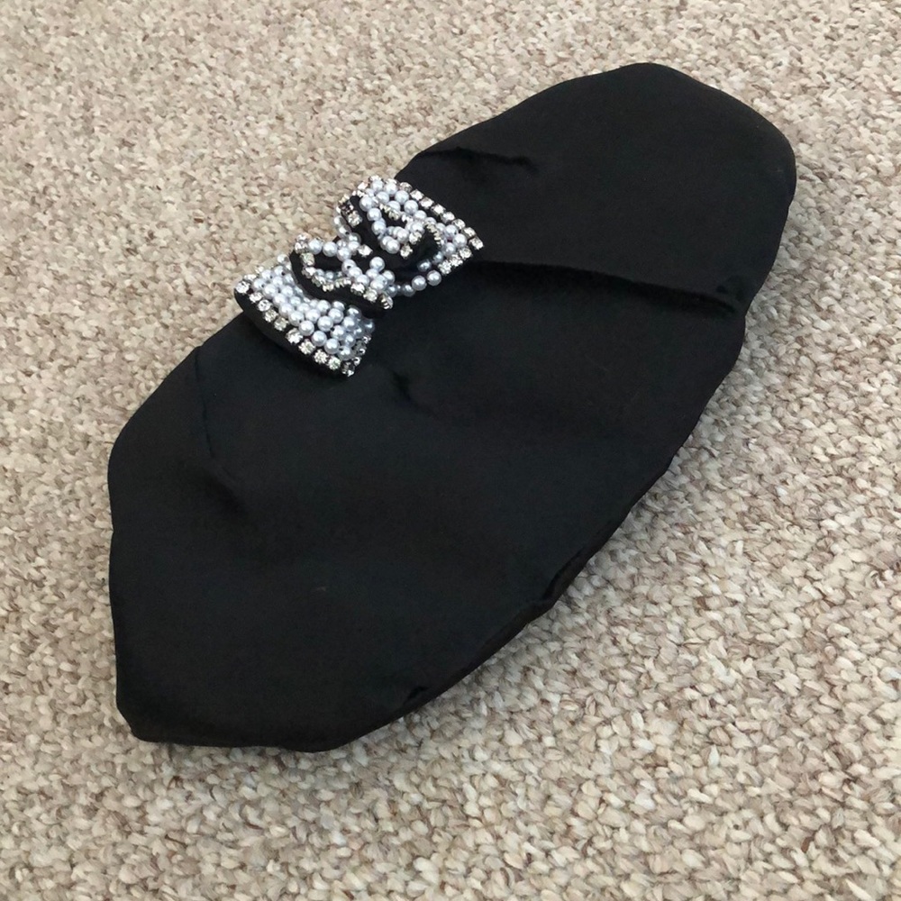 Pacomena black clutch with beaded bow